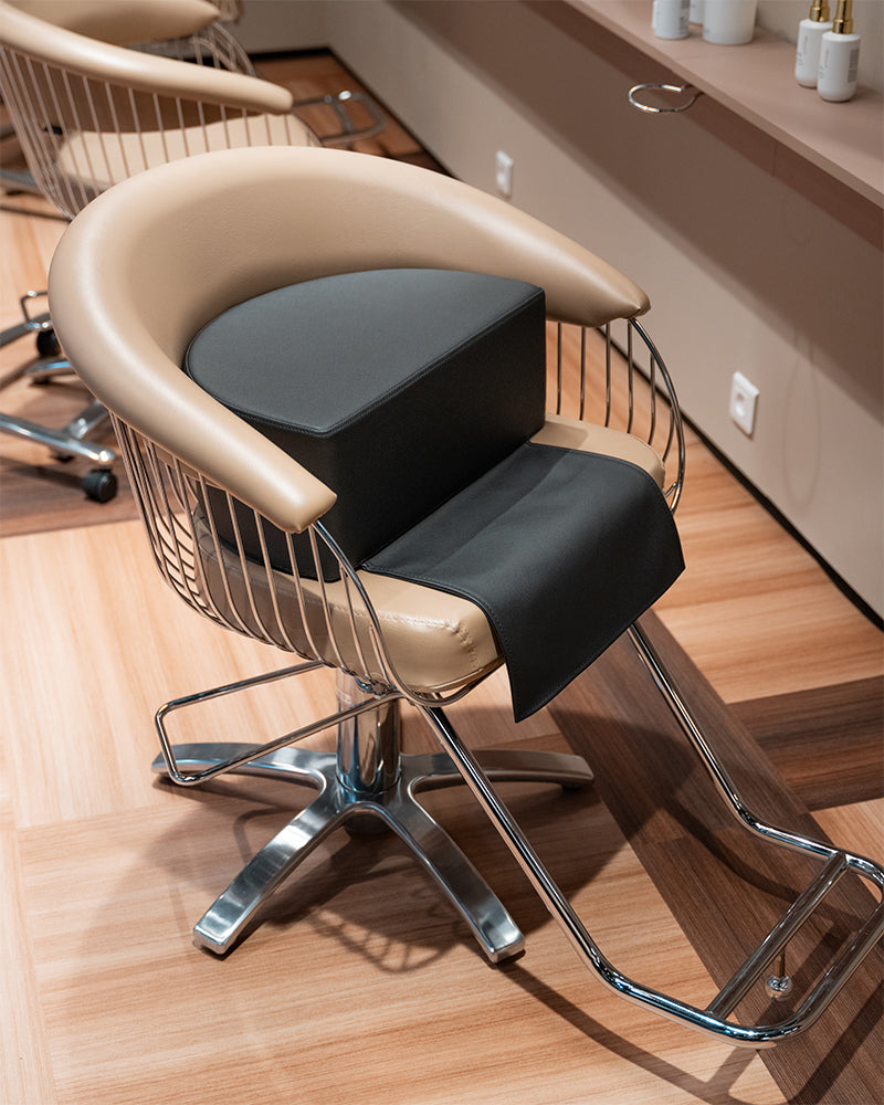Rehausseur pour fauteuil de coupe